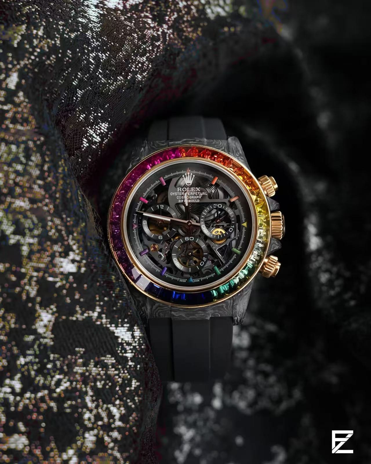 fc40195cfcd03f3a7a570101fa9cbf98.jpg Rolex Daytona Model 1100700 Rainbow Bezel - Image 1